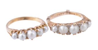 A late Victorian half pearl five stone carved half hoop ring, circa 1900, the graduated half pearls