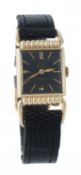 Elgin, Deluxe, a gold filled wristwatch, circa 1951, no. 386342, the two piece case with hinged