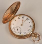 A 9ct gold keyless hunter pocketwatch, the white enamel dial with arabic numerals, subsidiary