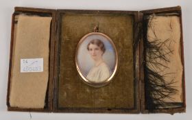 English school (early 20th century) Portrait miniature of a young lady, 5.7cm x 4.3cm, oval, in a