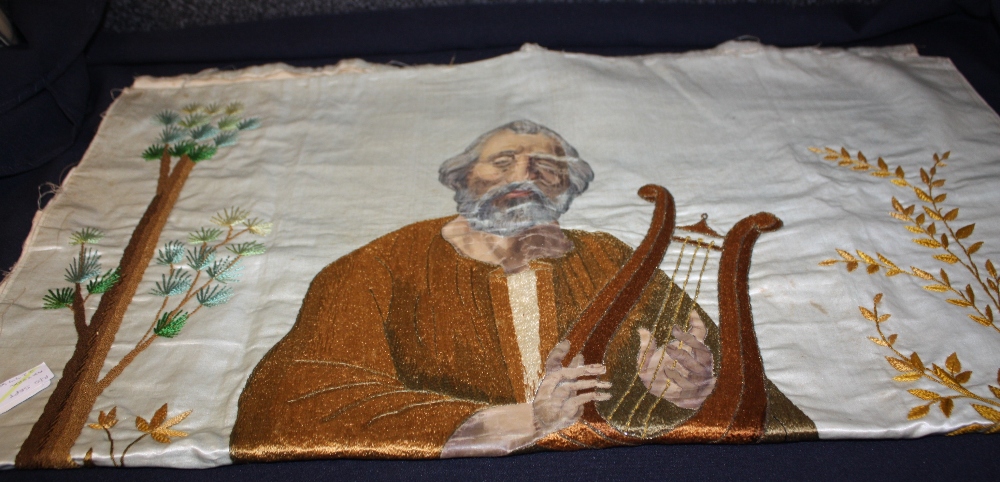 A 19th Century silk work tapestry of a religious man playing lyre (1870-1890) hand painted on silk -