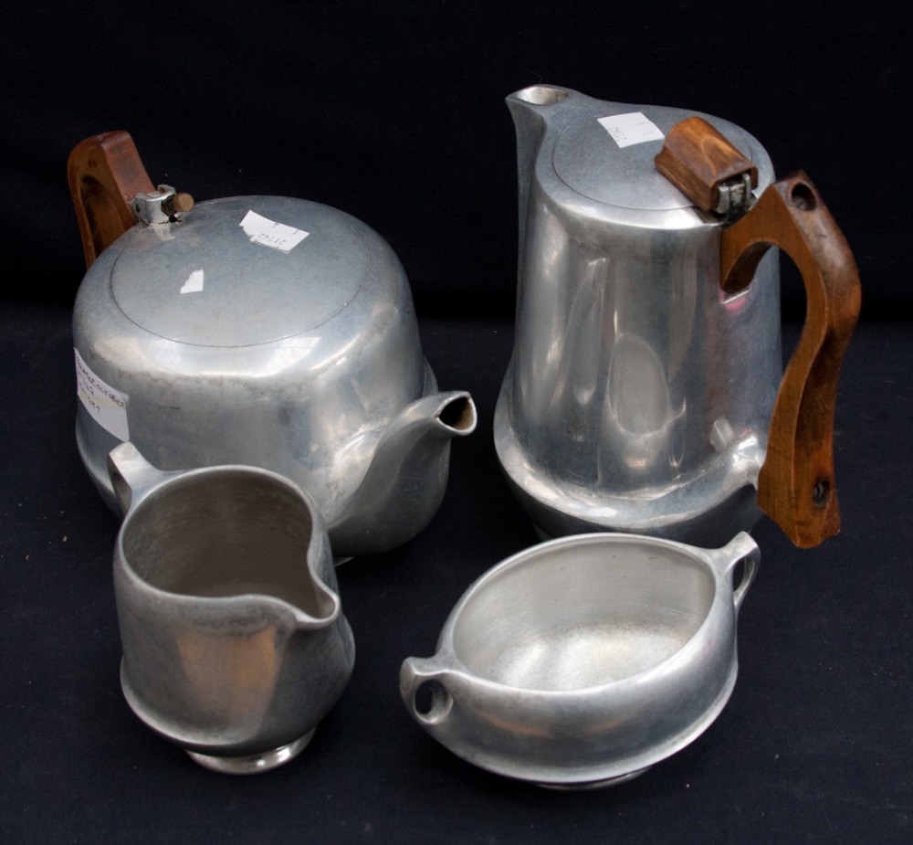 A Picquot ware tea service, comprising tea pot, coffee pot, hot water jug, jug, sugar bowl, (5)