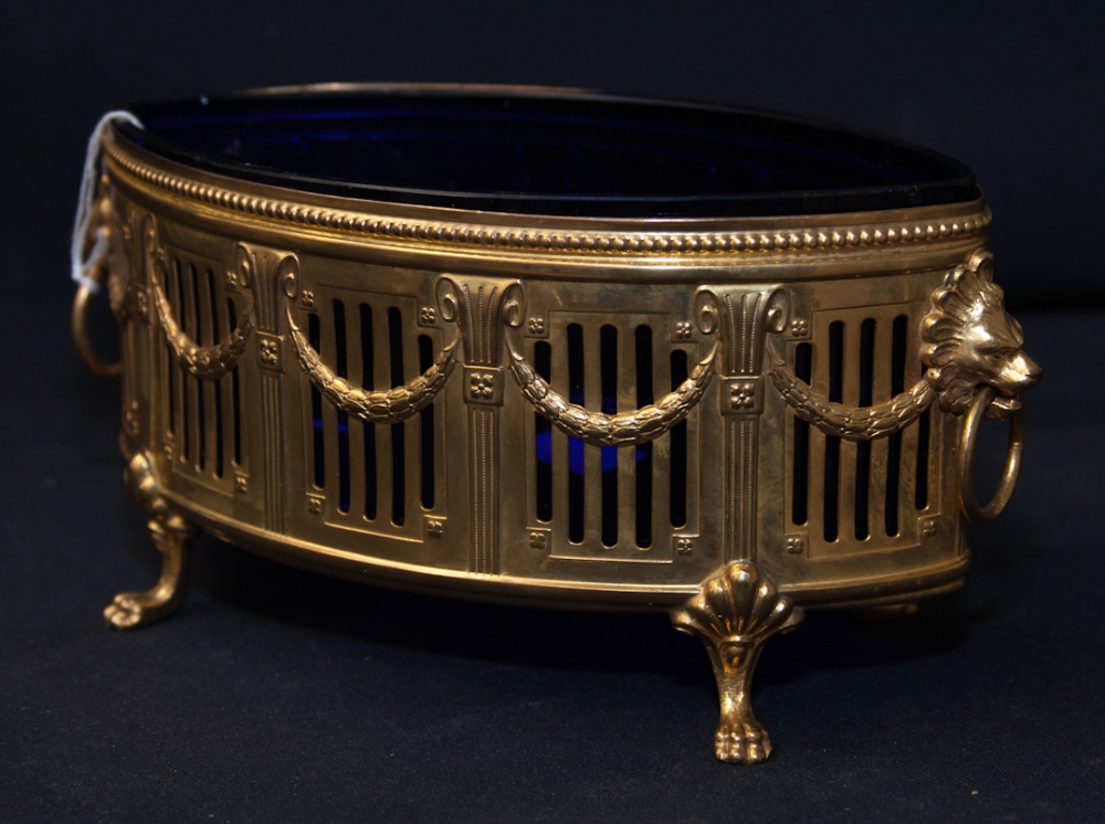 A 'WMF' gilt metal oval centrepiece, the pierced frieze with fluted columns and husk swags, having a