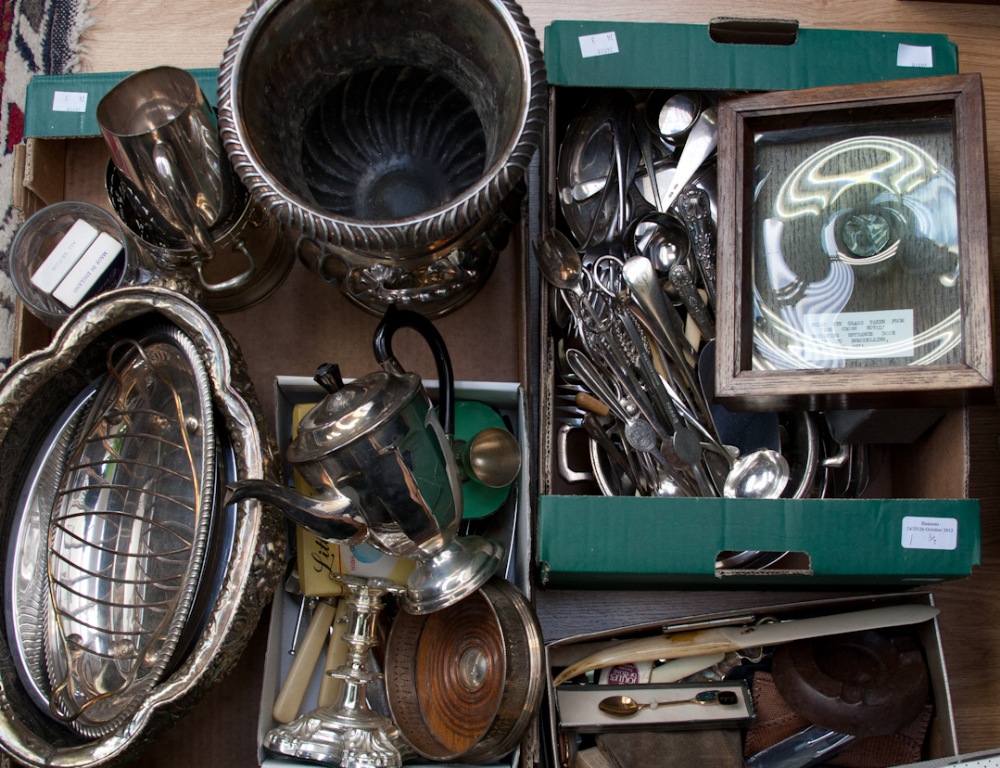 Three Boxes Containing A Collection of Silver Plate, including a wine cooler, coffee pot,