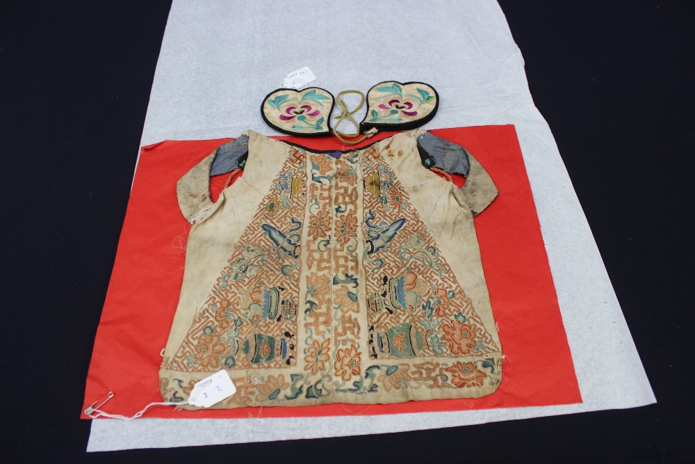 A Chinese vintage child's overdress and ear muffs, circa approx 1770/1800 (2)