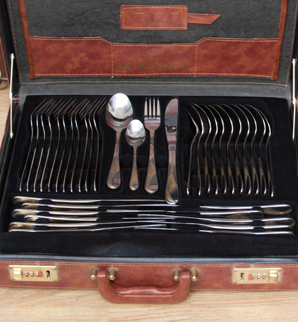 A Solingen two layer comprehensive set of cutlery in a briefcase, made in Germany, from chrome