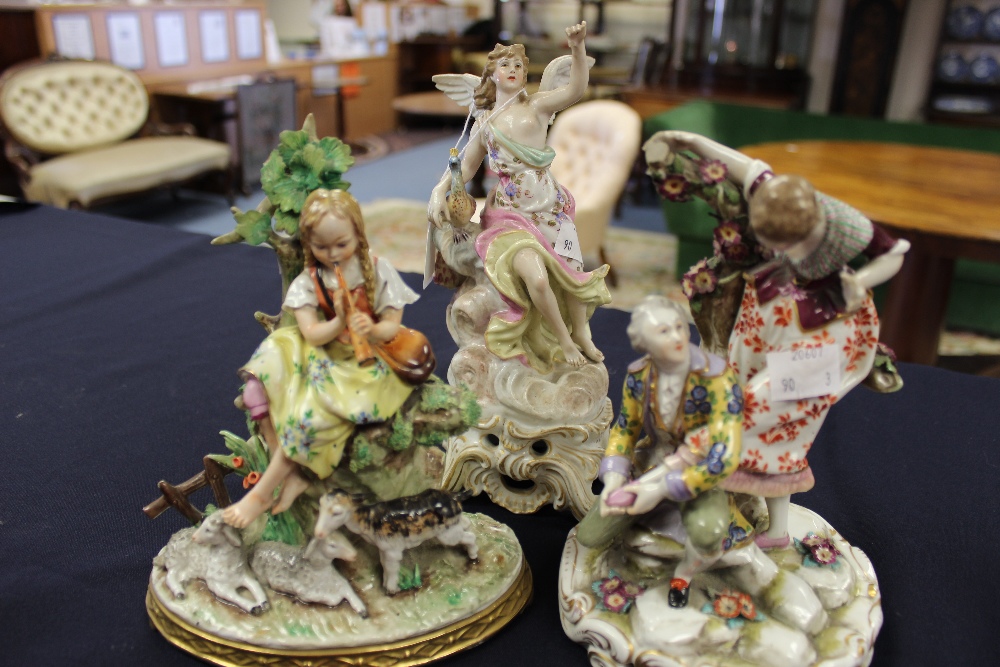 A Dresden figural group; a Sitzendorf style figure group of young girl playing a fruit; etc (3)