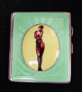 **IN RECEPTION** An Art Deco silver-plated cigarette case, the hinged cover centred with an oval