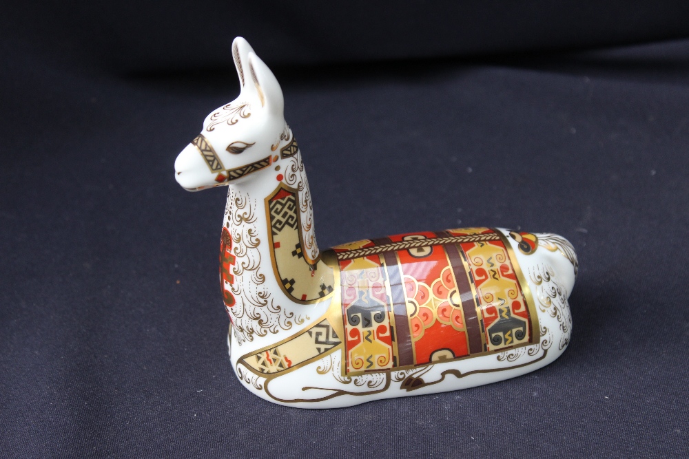 A Royal Crown Derby paperweight, Llama, signed, boxed
