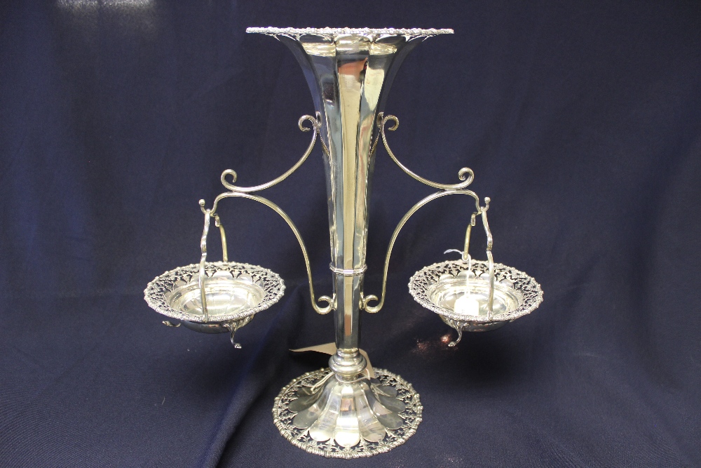 **IN RECEPTION** An early 20th century EPNS epergne, the trumpet shape vase with pierced edge and