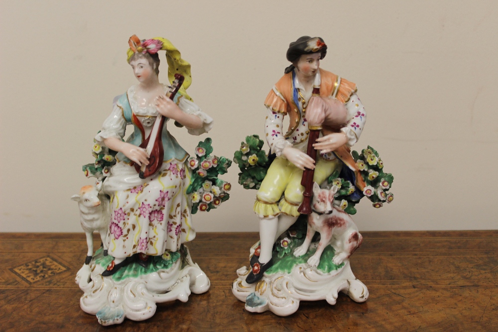 A pair of Derby style figures, lady and gentleman musicians