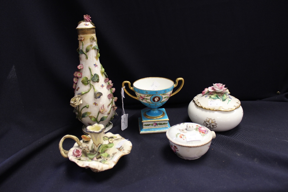 A Meissen style bottle vase and cover, encrusted with flowers, painted with insects; a Limoges