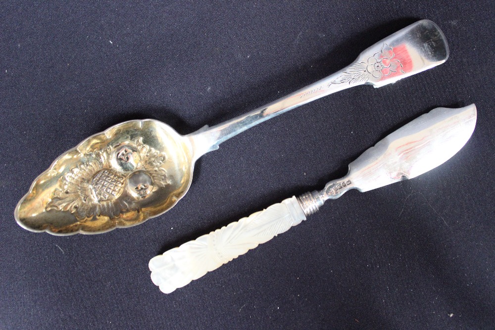 A George III fiddle pattern berry spoon with gilt bowl, London 1814; together with a Victorian