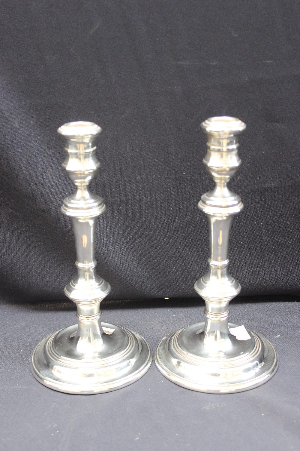 A pair of silver candlesticks