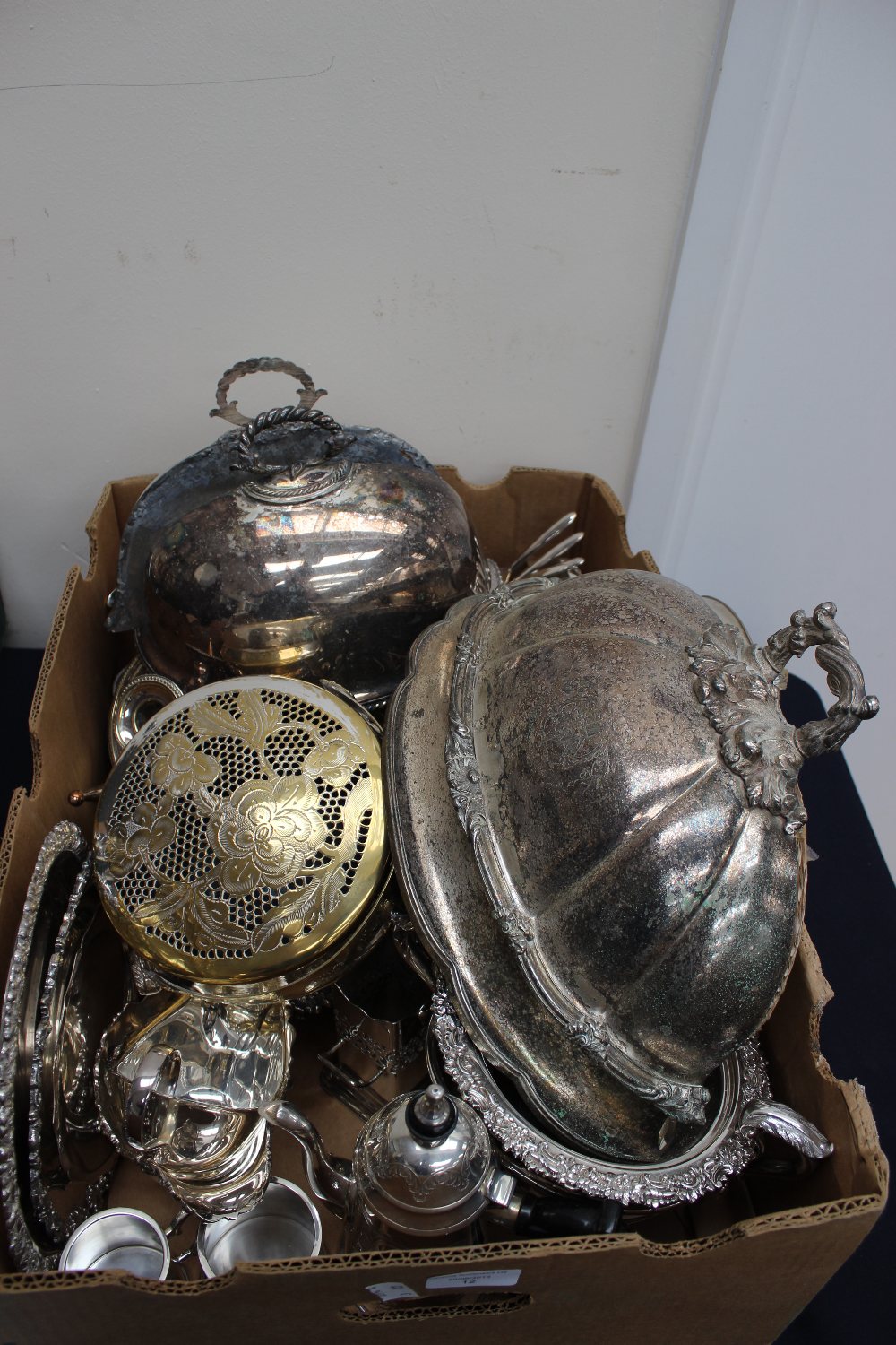 A quantity of plated ware including tea set; bowls; cruets; bowls; lobster forks; etc