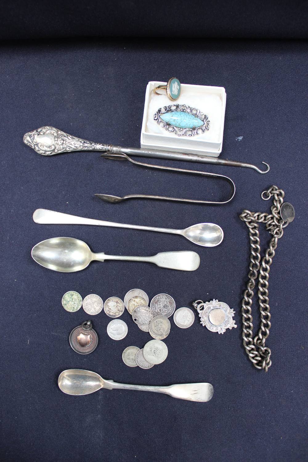 Assorted silver items.