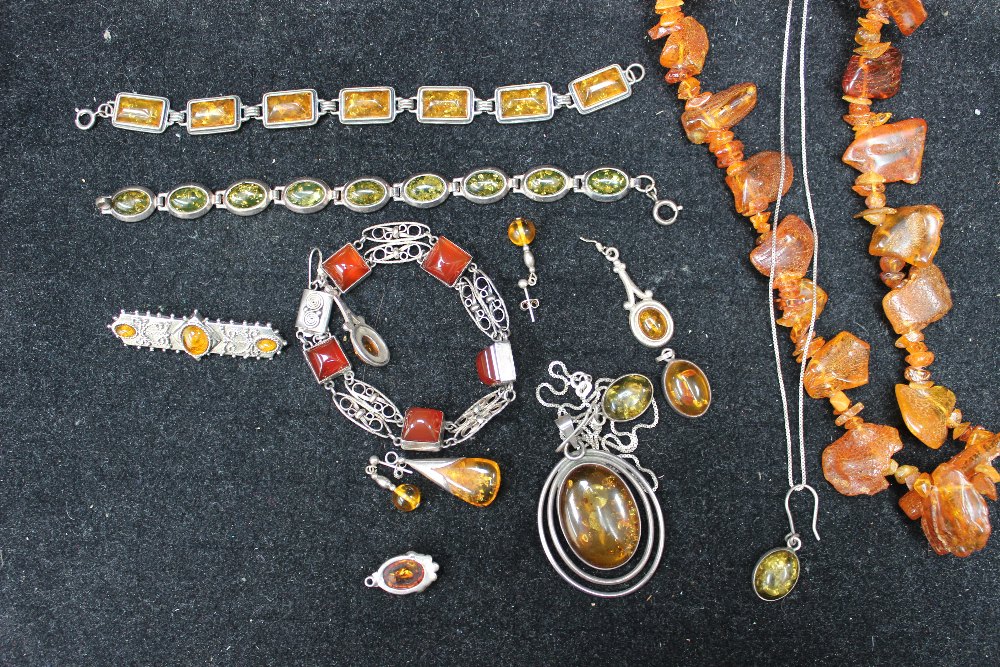 Group of amber earrings, necklace, bracelet etc.