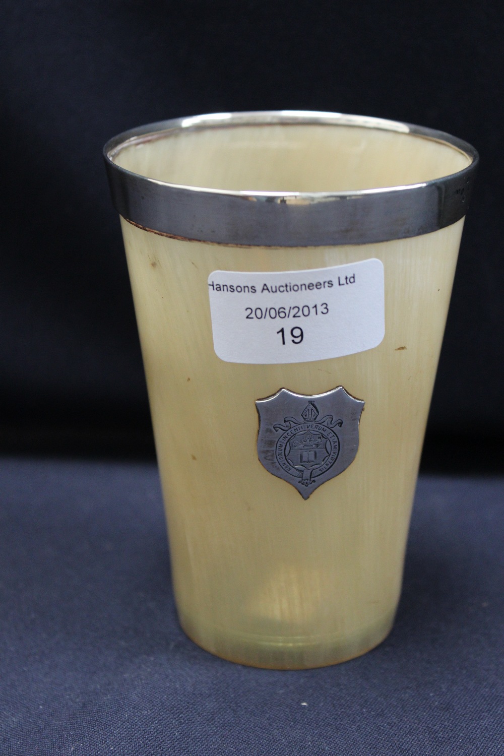 A silver mounted horn beaker, crested