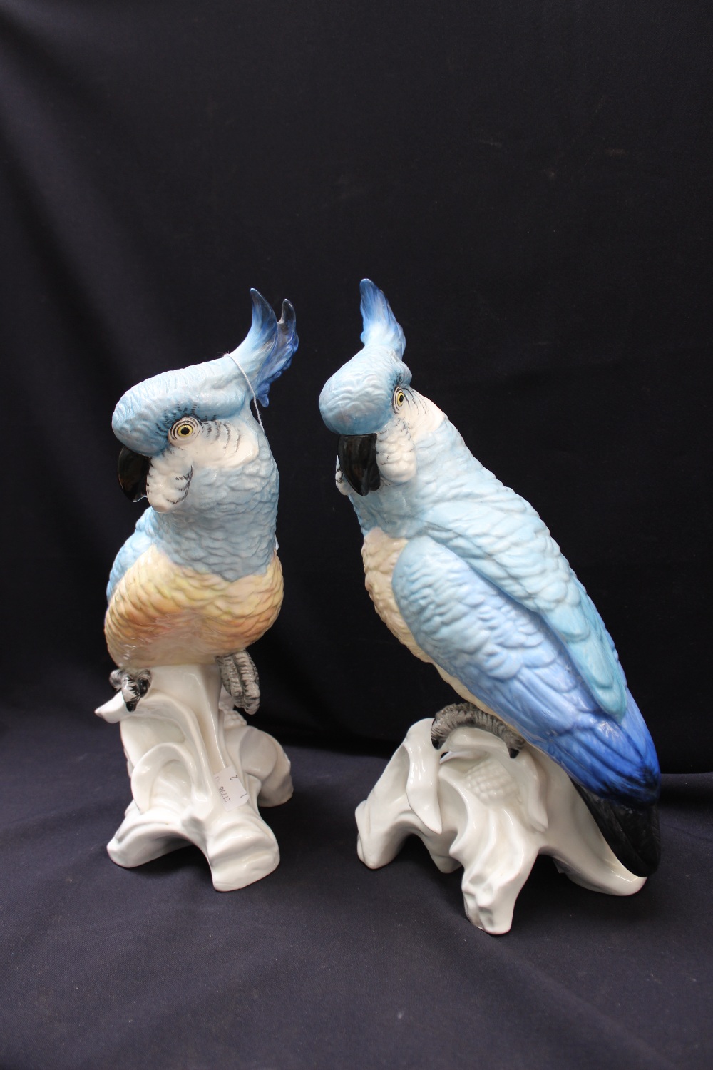 Two Staffordshire Cockatiel's, both signed to the base by modeler J.T. Jones, both 33 cms h