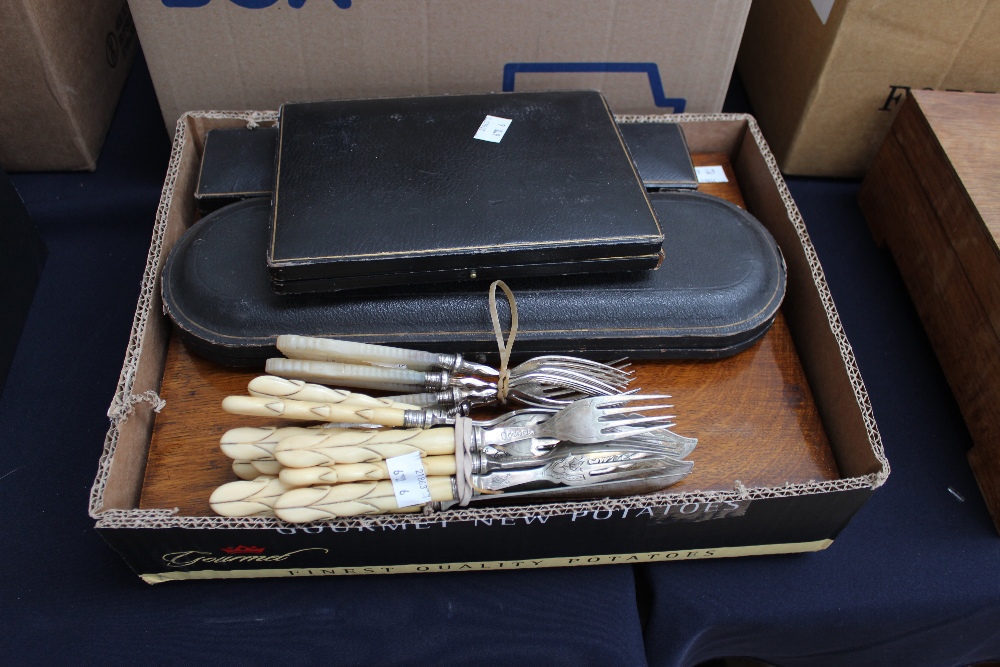 A late Victorian plated toasting fork, in black Morocco case; a loose collection of ivory and mother