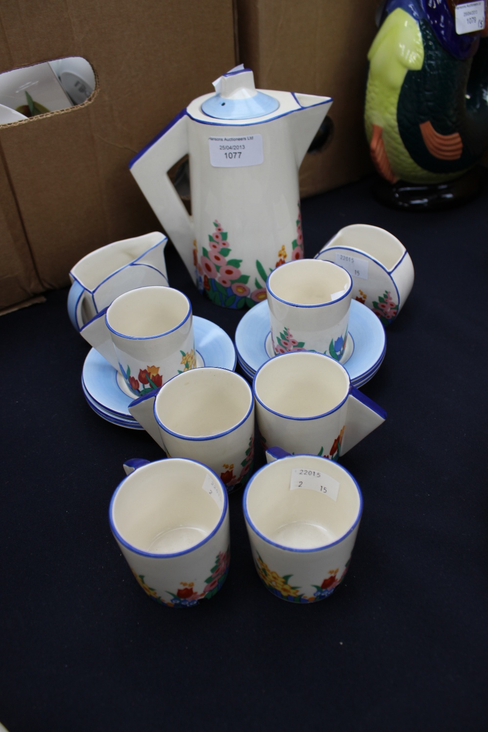 An Art Deco Newport pottery `Chloris` coffee set, in the style of Clarice Cliff 1930s, including six