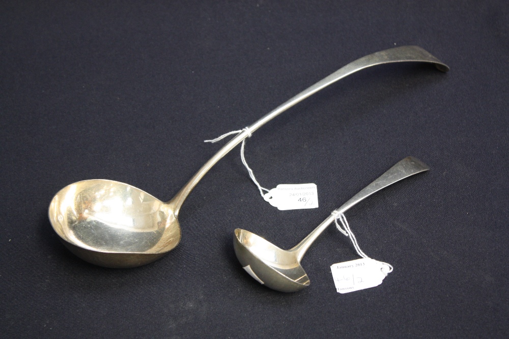A George III silver ladle, London, 1815, crested; a smaller ladle, London 1806 (2)