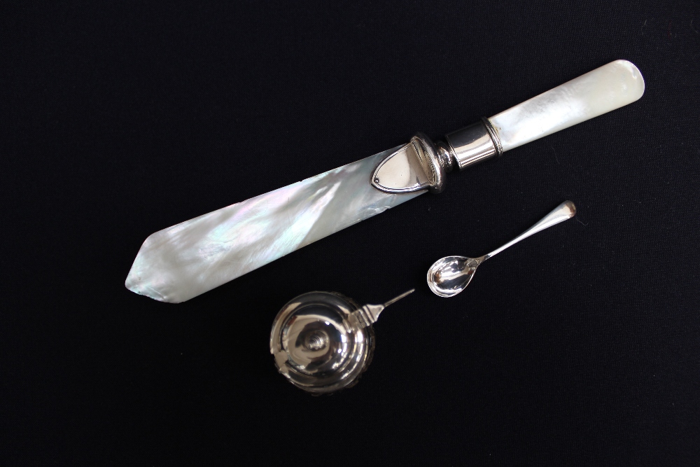 A silver-mounted mustard and spoon and a silver-mounted mother of pearl paper knife