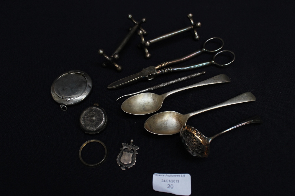 Two Sheffield hallmarked silver teaspoons by C.B and S; a hallmarked silver medal; Birmingham