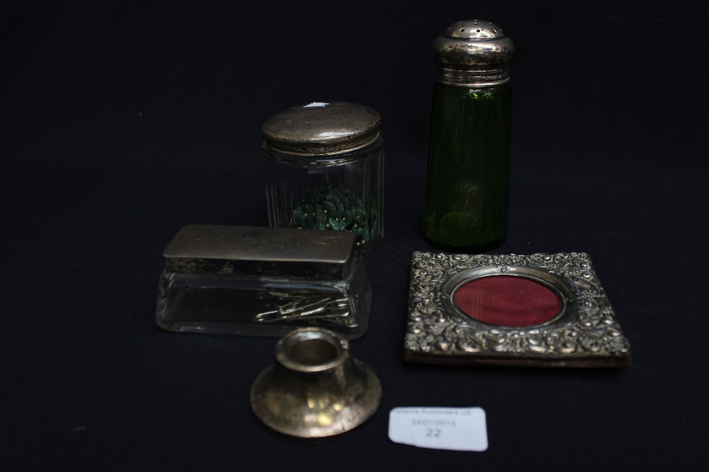 A silver three and a half square frame with repousse decoration together with a 19th century green