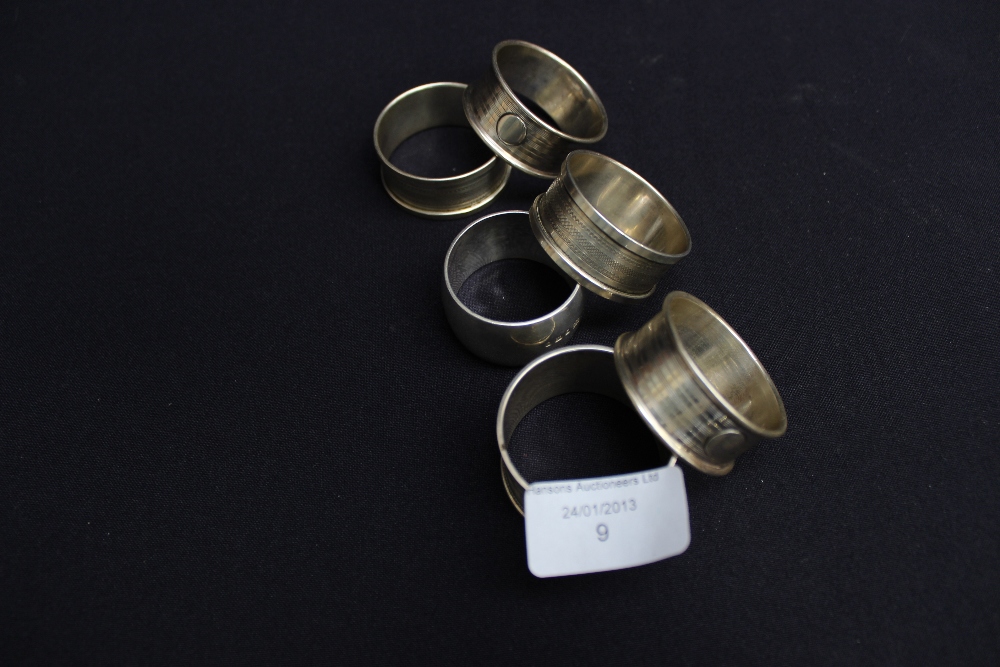 Six silver napkin rings, approx 2.96 ozt