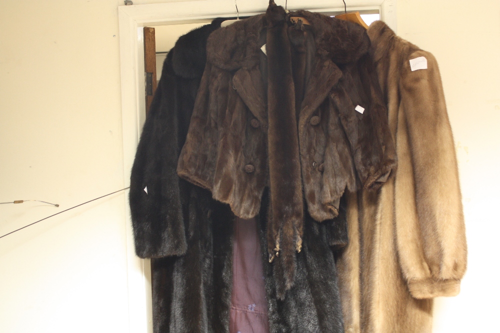 Three mink fur coats and a mink stole (4)