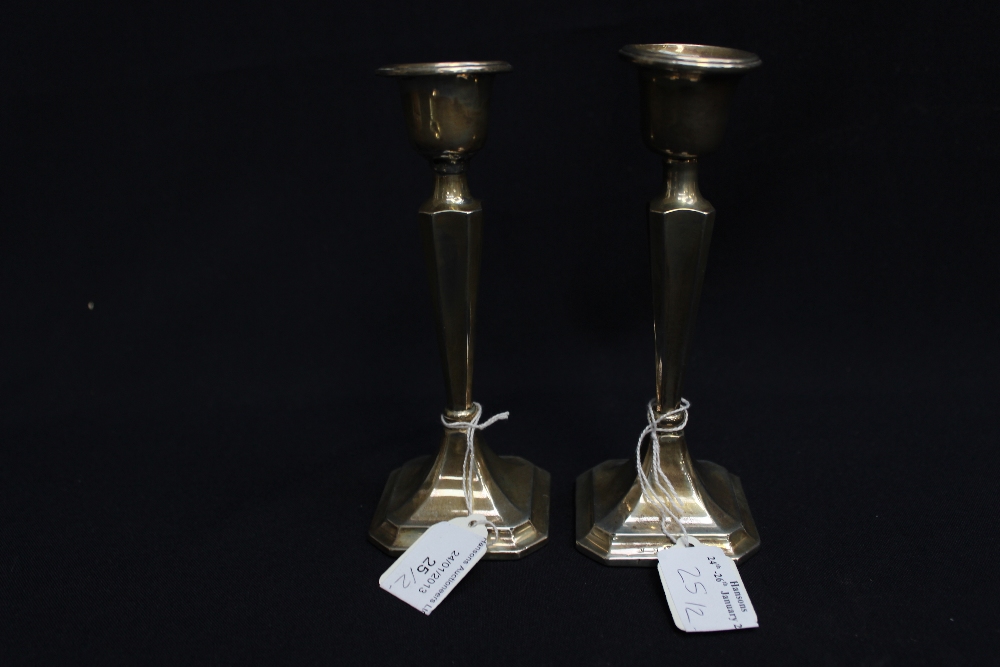 Pair of silver candlesticks, hallmarked Chester 1923 (filled) gross weight approx 9ozt .