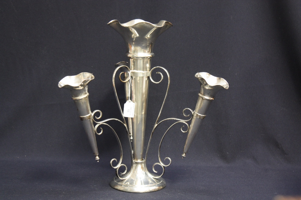 A Walker and Hall silver four-branched trumpet epergne, flared rims, circular foot, Sheffield