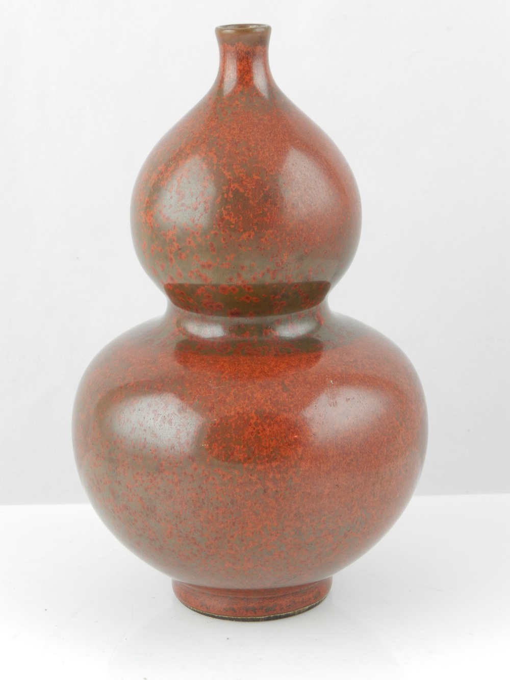 A Chinese porcelain double gourd vase, bears four character mark to base.
