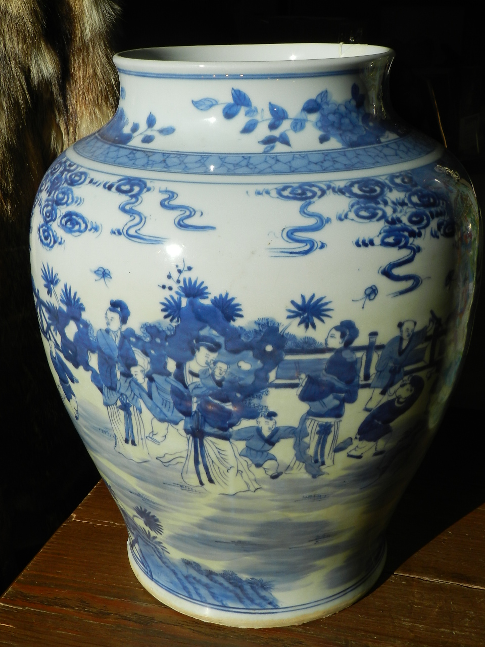 A Chinese 19th/20th century blue and white baluster shape vase, decorated with children playing