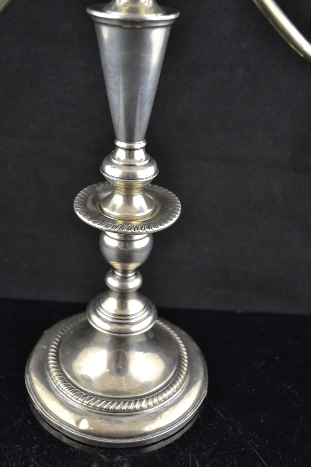 A pair of American 'Fisher' sterling silver twin branch candelabra.