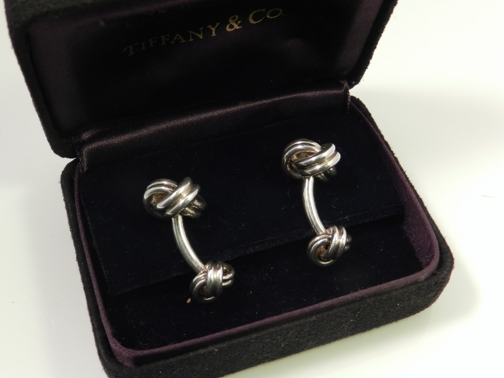 Tiffany & Co., New York. A pair of 925 silver cufflinks of knot form.