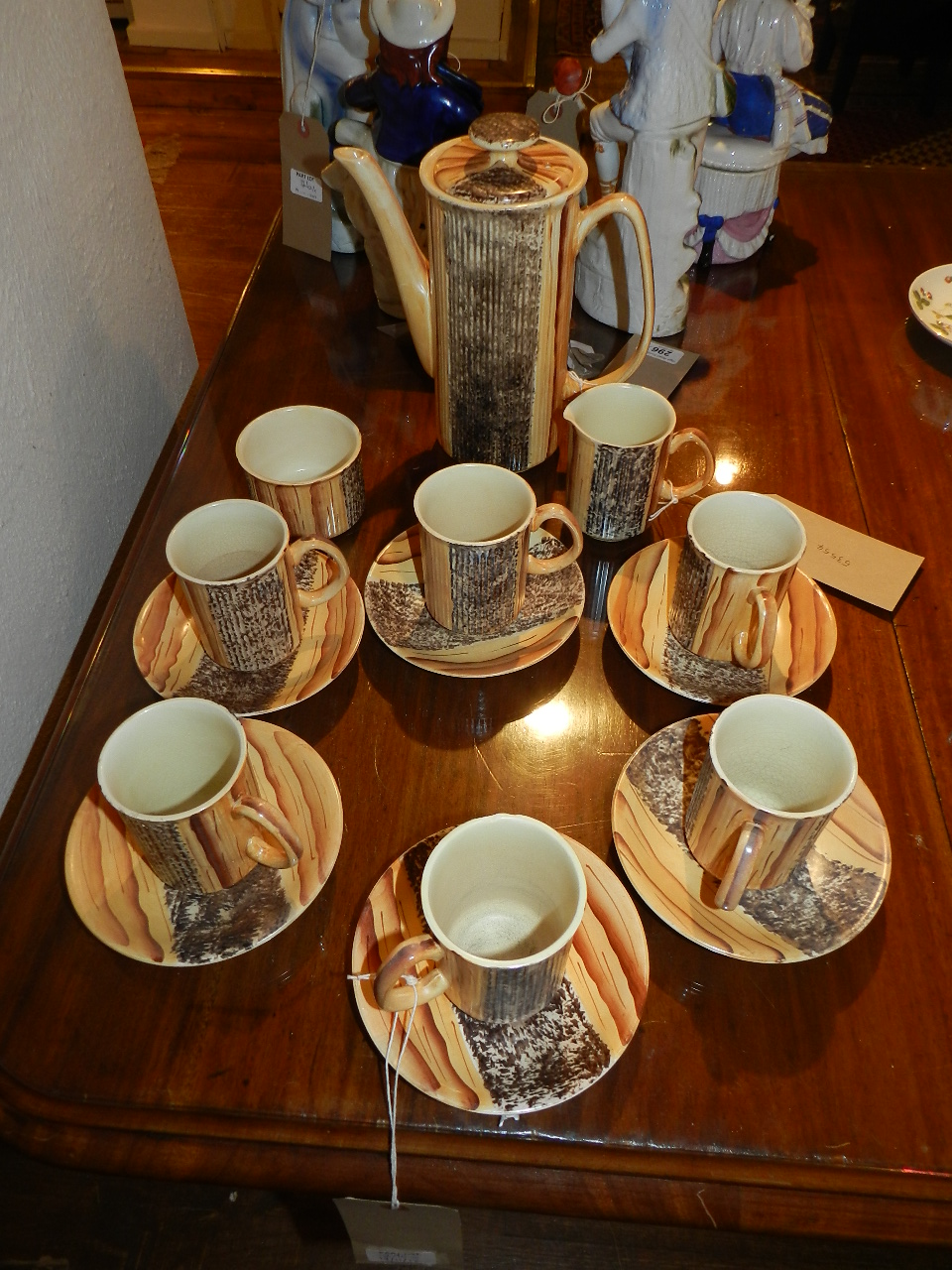 A 20th century Price Kensington pottery coffee set, having coffee pot, six cups, milk jug and