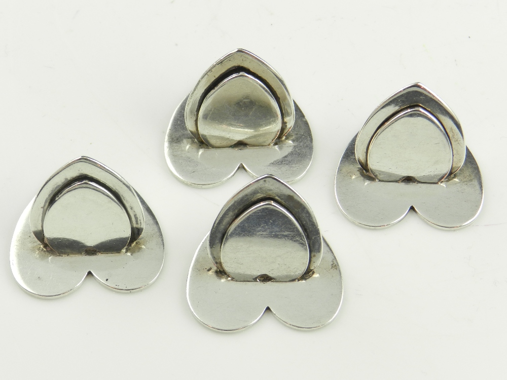 Sampson Mordan. A set of four silver menu holders, heart form, hallmarked London 1927.