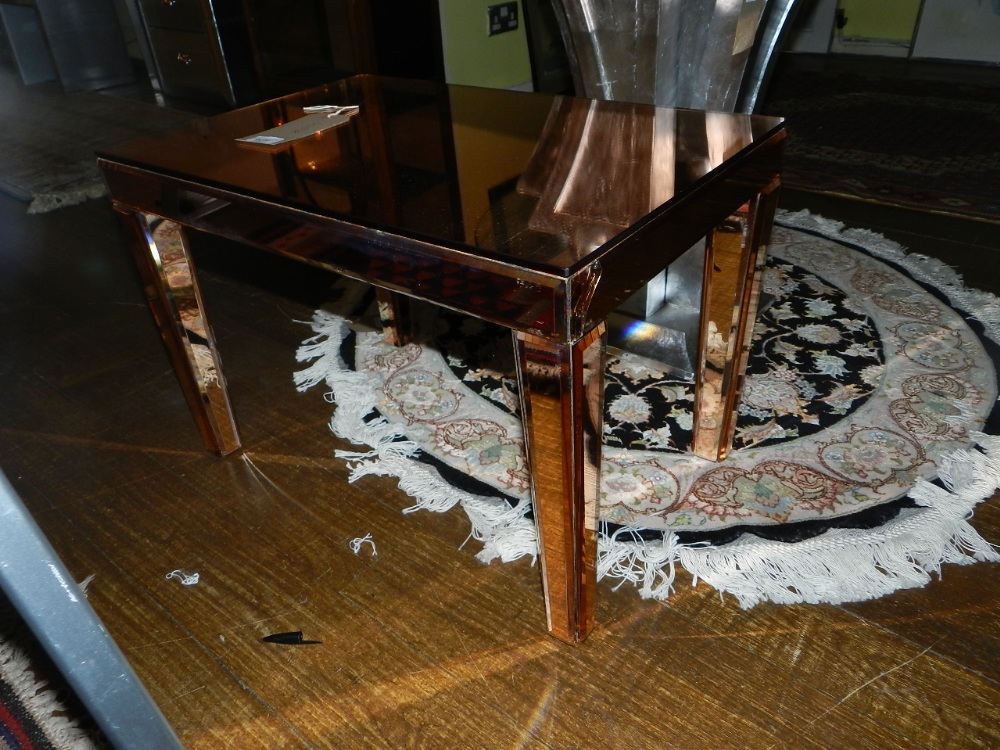An Art Deco style bevelled mirror glass occasional table.