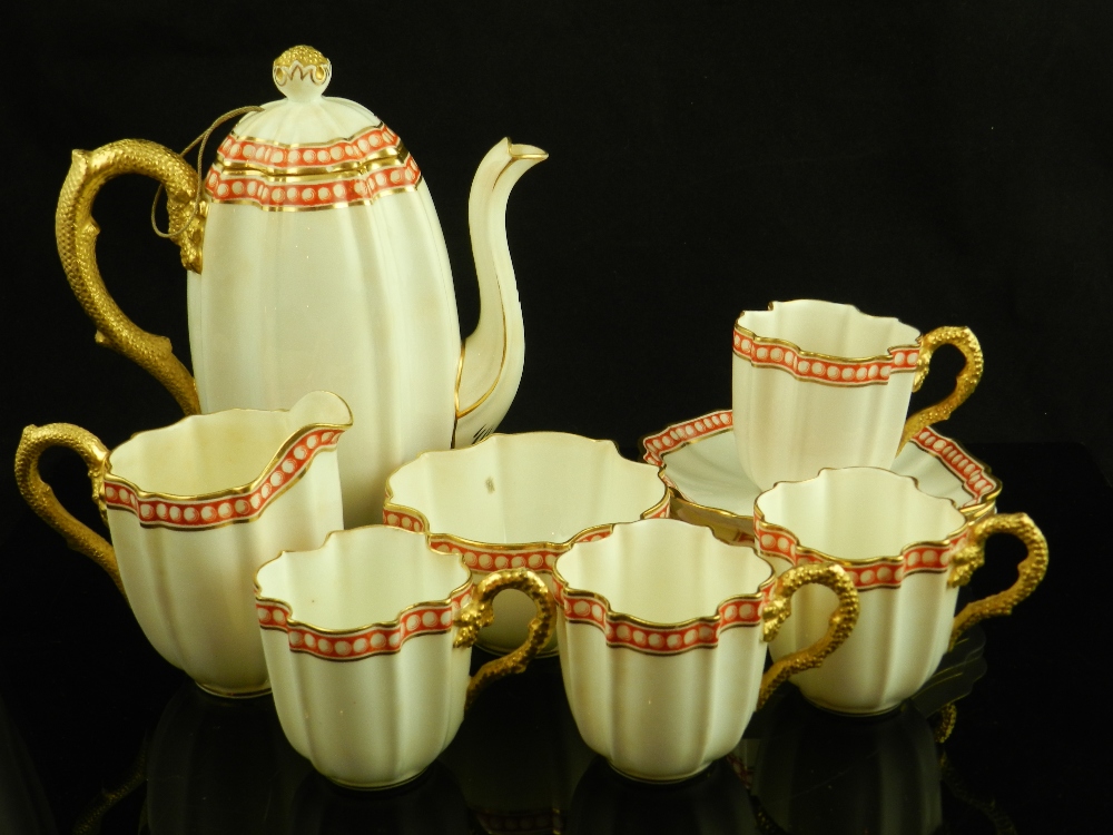 A Coalport coffee set with gilt handles and fluted cylindrical bowl, cream jug and four cups and