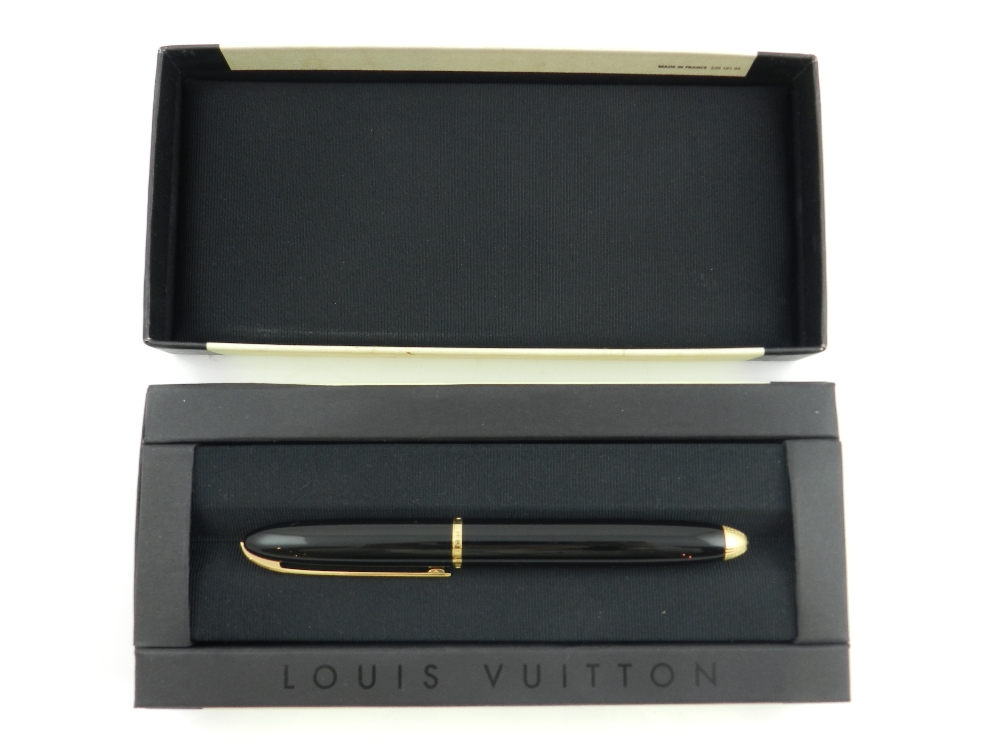 A Louis Vuitton fountain pen with 18ct gold nib, in original fitted box with documents.