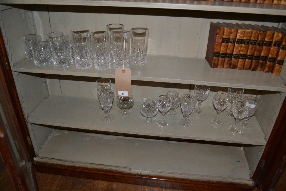 A quantity of lead cut glass drinking vessels, to include a set of six wine glasses, six tumblers,