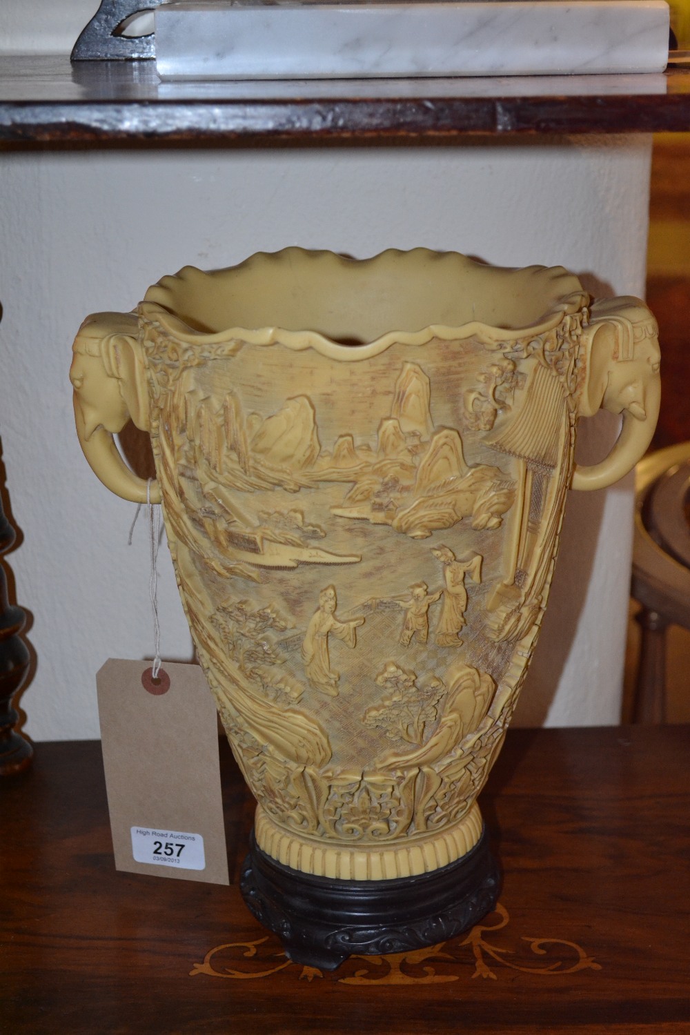 A large Oriental vase of faux ivory appearance with pierced elephant handles, mid 20th century or