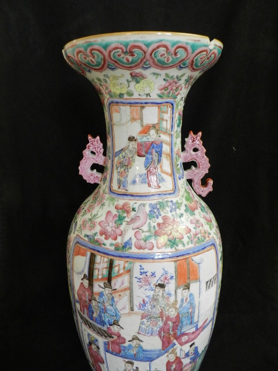A large fine 19th century Chinese twin handled famille rose vase decorated on both sides with panels