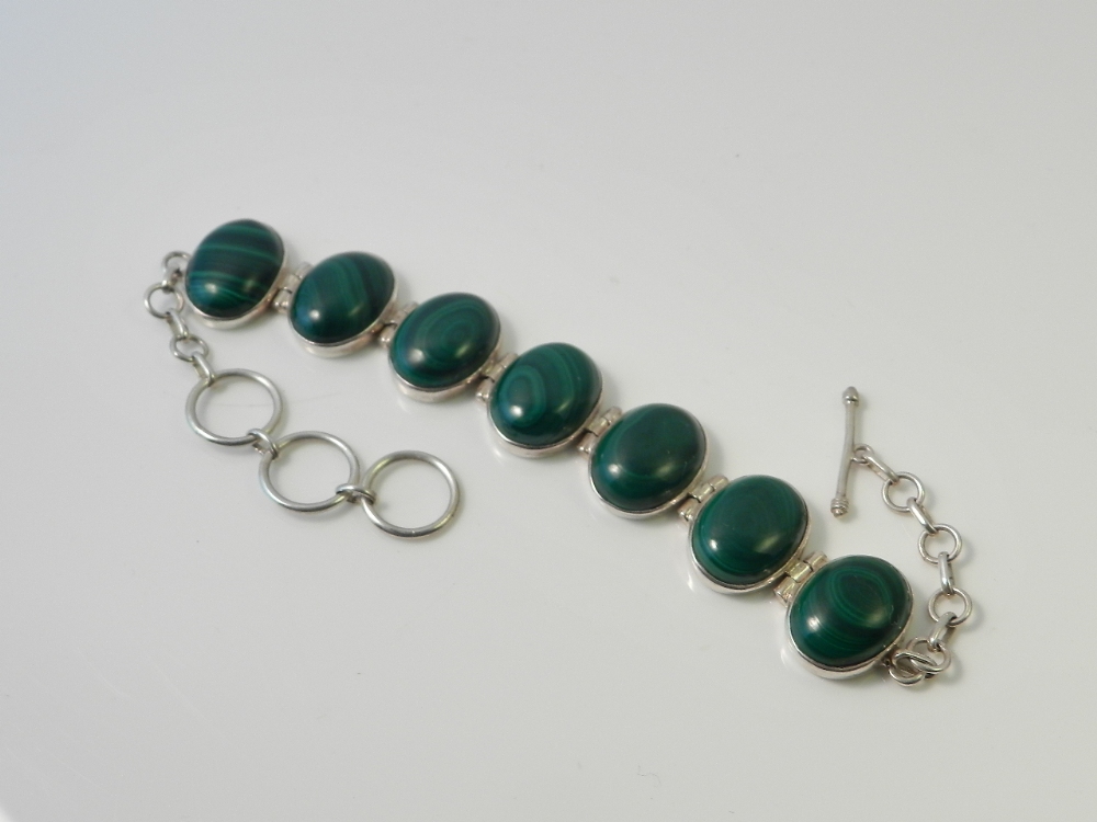 A cabachon malachite mounted 925 silver ladies bracelet.