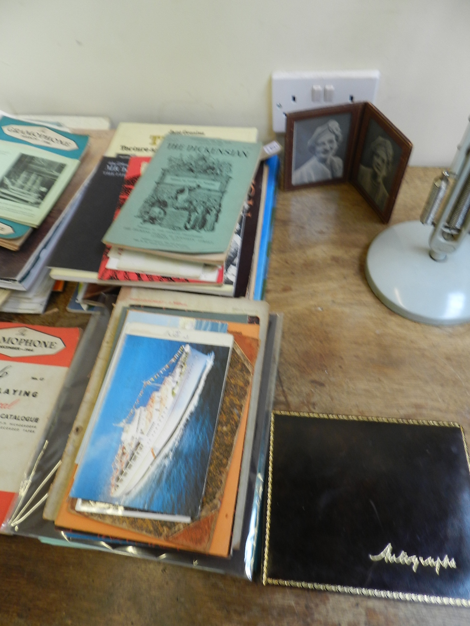 A box of assorted pamphlets, newspapers and prints.