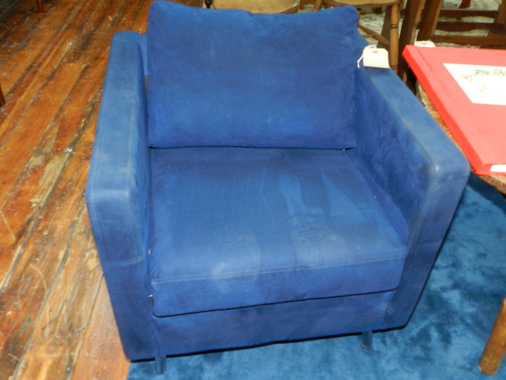 A pair of contemporary Royal Blue upholstered square section tub chairs raised on chrome supports.