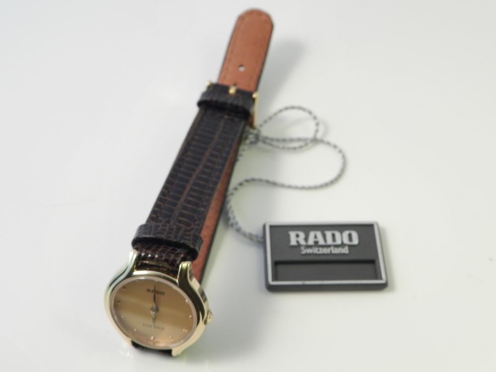 A ladies Rado Florence gilt metal cased dress watch with box.