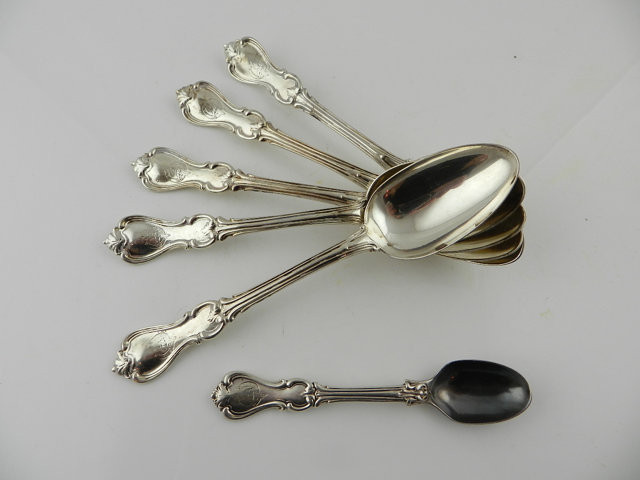 A Georgian hallmarked part canteen of cutlery to include six dinner forks, six spoons, five